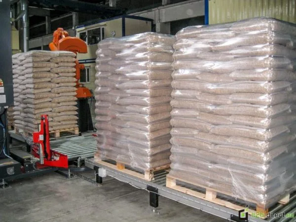 Wrapped pallets of bagged wood pellets on a packing line
