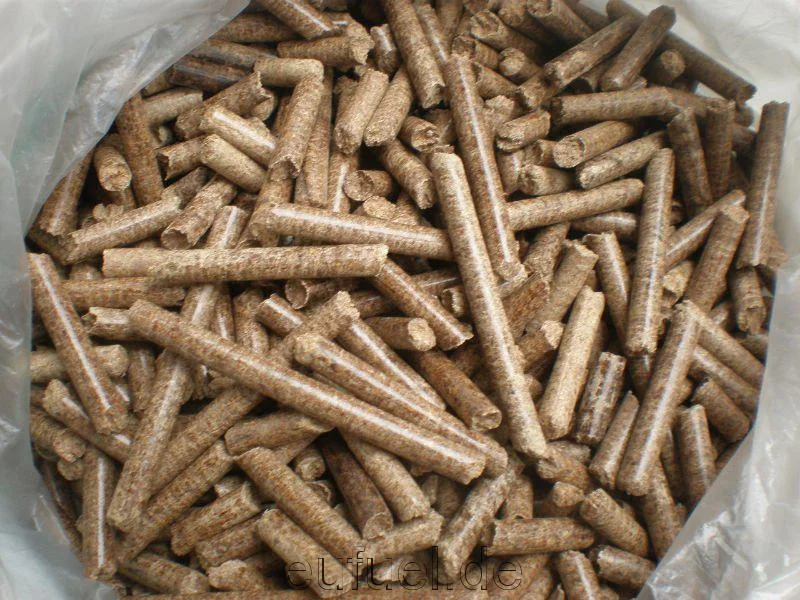 Close-up of industrial wood pellets in an open bag